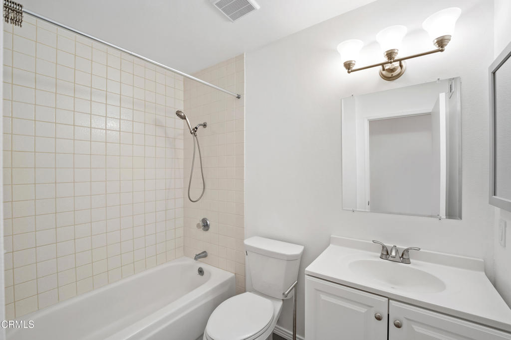 1511 Fathom Drive Oxnard, CA 93035 - Photo 21 of 29 a bathroom with a sink toilet and shower