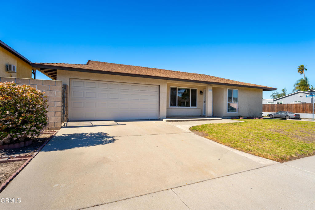 1511 Fathom Drive Oxnard, CA 93035 - Photo 3 of 29 a front view of a house with a garage