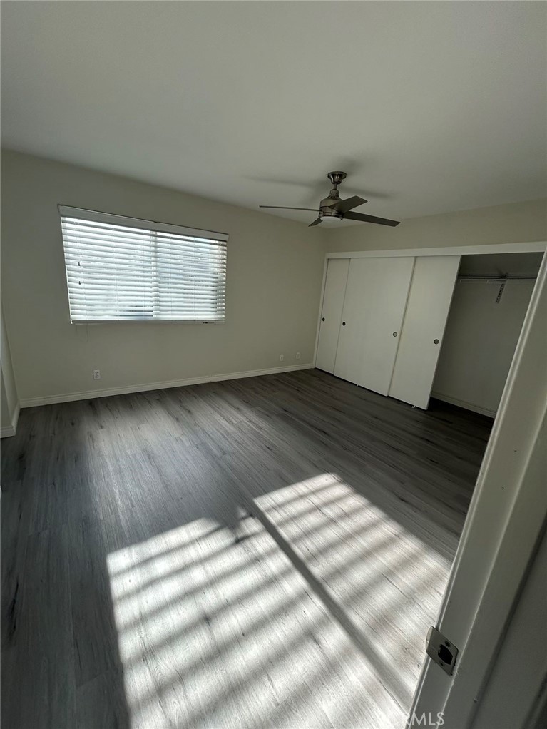 37 Butterfield Irvine, CA 92604 - Photo 6 of 9 wooden floor in an empty room with a window