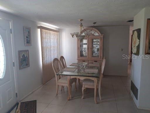 3600 Darlington Road Holiday, FL 34691 - Photo 5 of 20 a view of a dining room with furniture and window