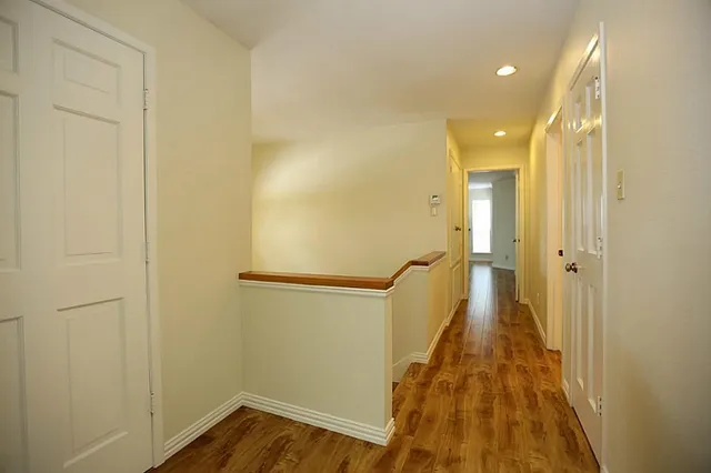 a view of a bathroom from the hallway
