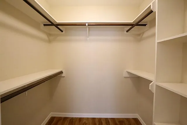 a view of a room with racks on the wall