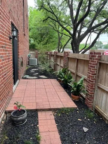 a backyard of a house with seating space