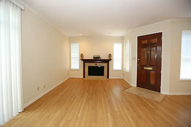 a view of a kitchen with a sink and a stove top oven
