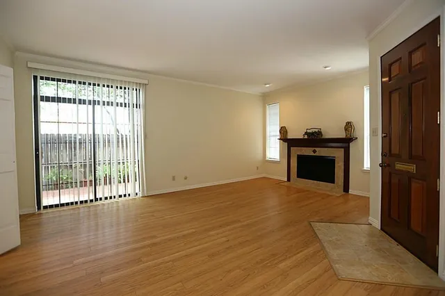 a view of a kitchen with a stove top oven