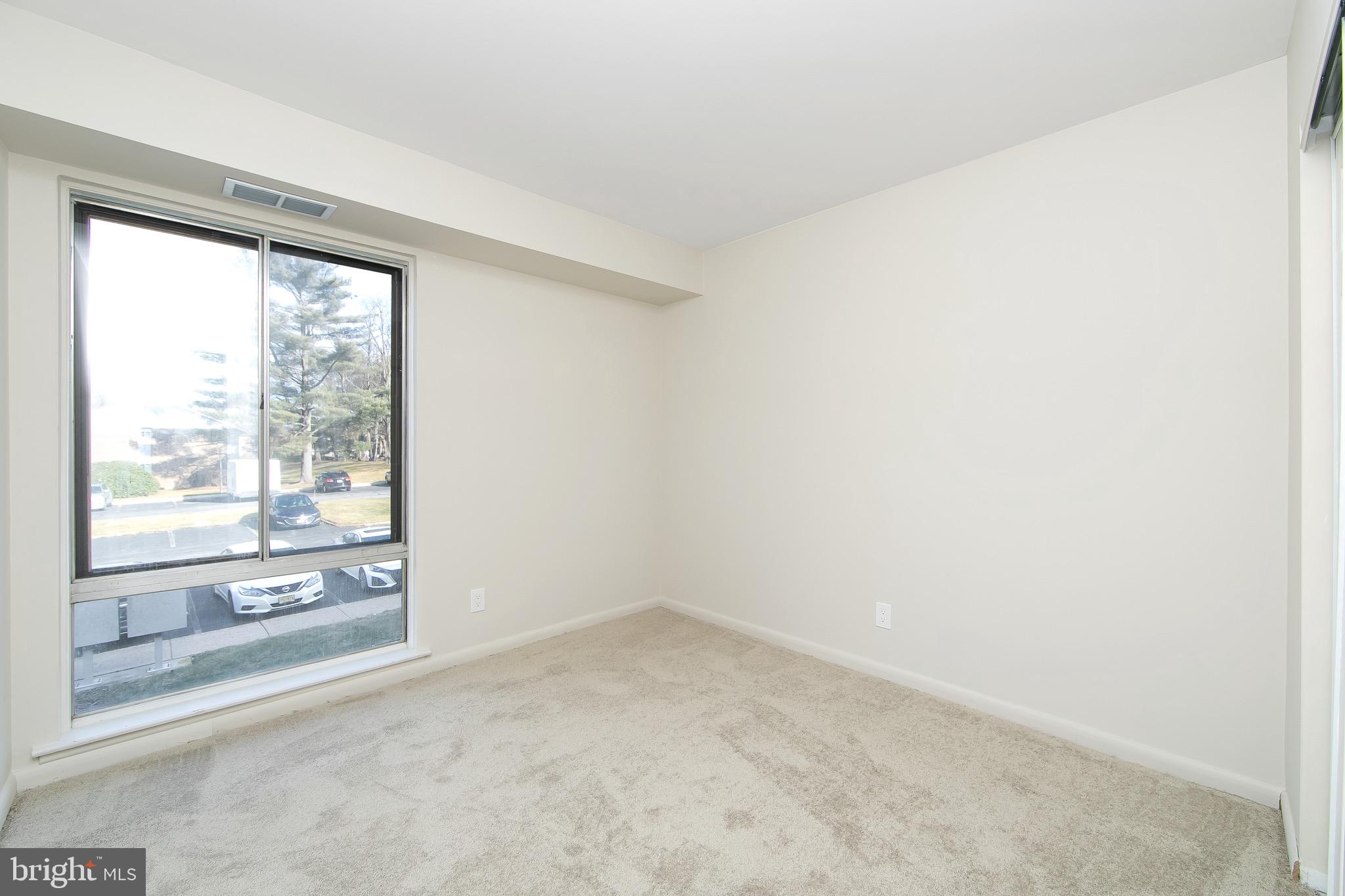 222 Echelon Road Voorhees, NJ 08043 - Photo 18 of 29 a view of an empty room with a window