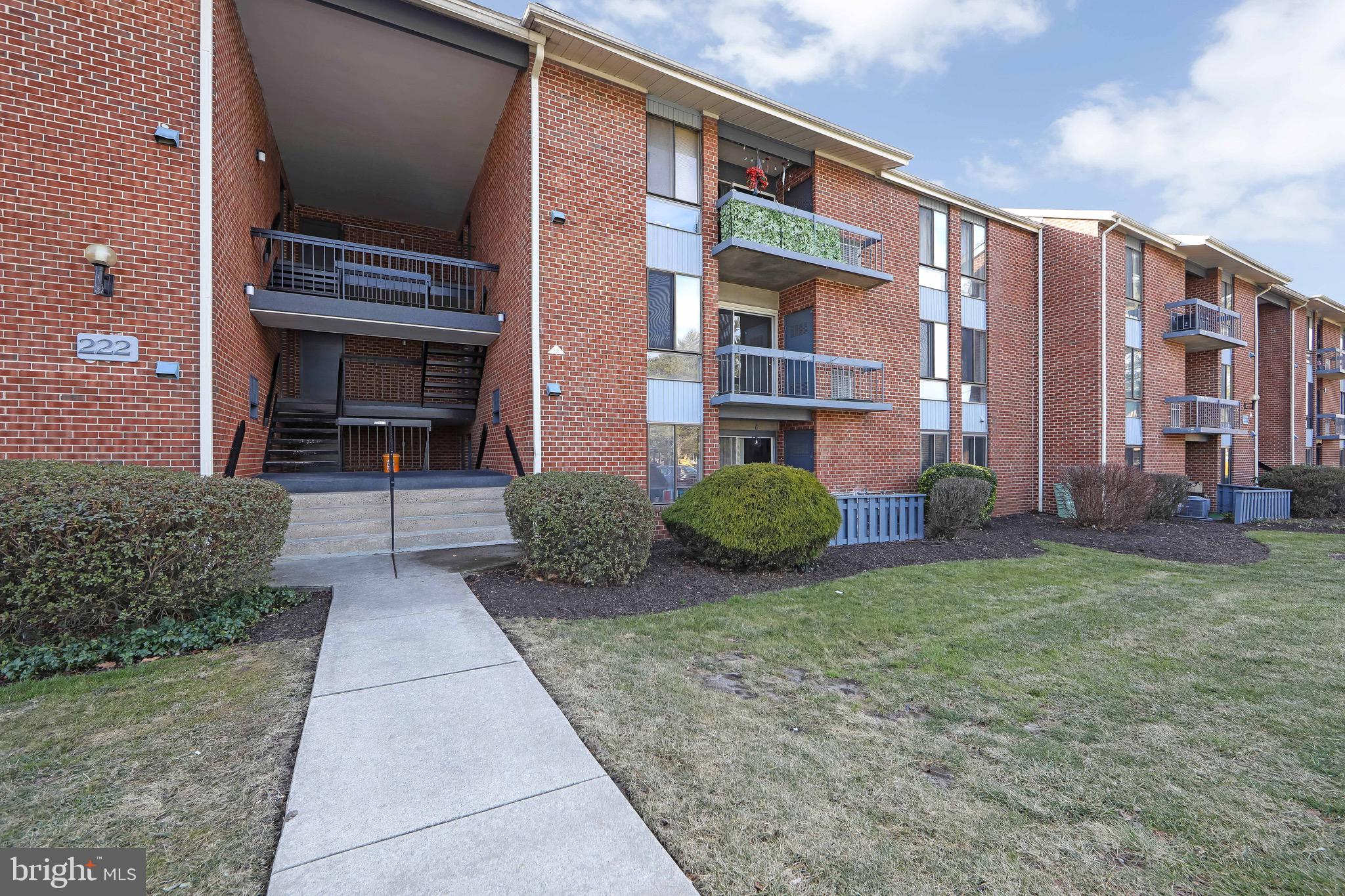222 Echelon Road Voorhees, NJ 08043 - Photo 28 of 29 a view of a building with a yard