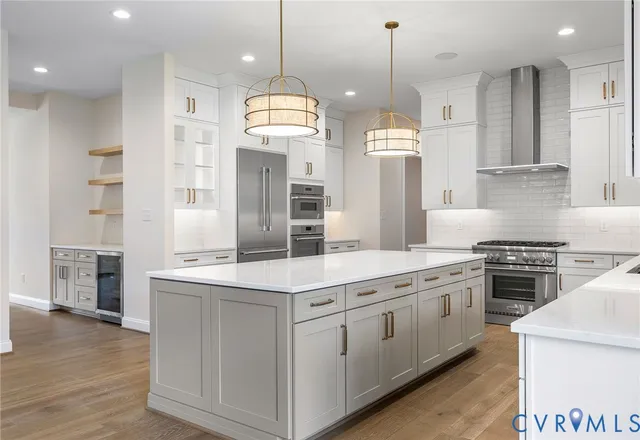 a kitchen with granite countertop cabinets and white stove