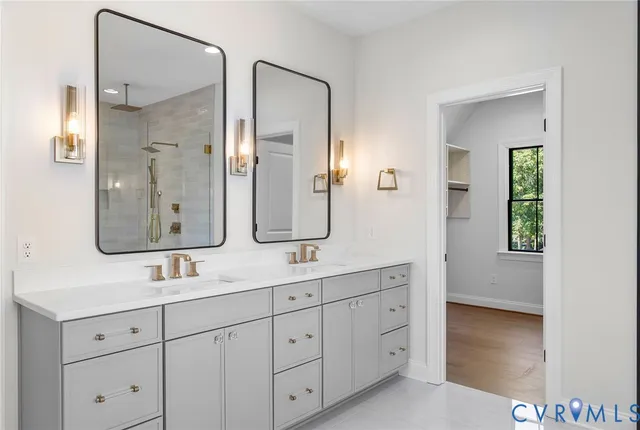 a bathroom with a bathtub and a shower