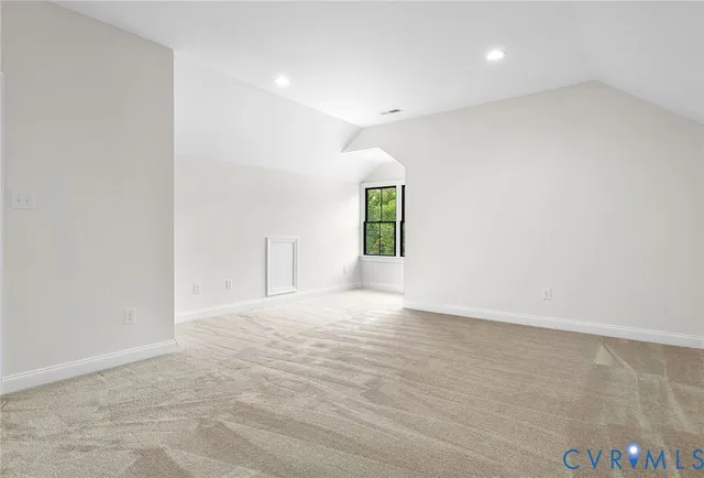 a bathroom with a sink a toilet a mirror and shower