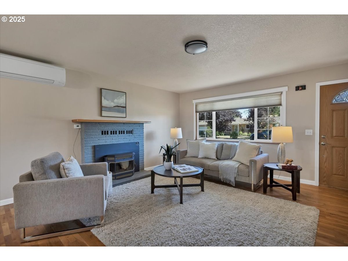 224 South 24th Street Philomath, OR 97370 - Photo 11 of 46 a living room with furniture and a fireplace