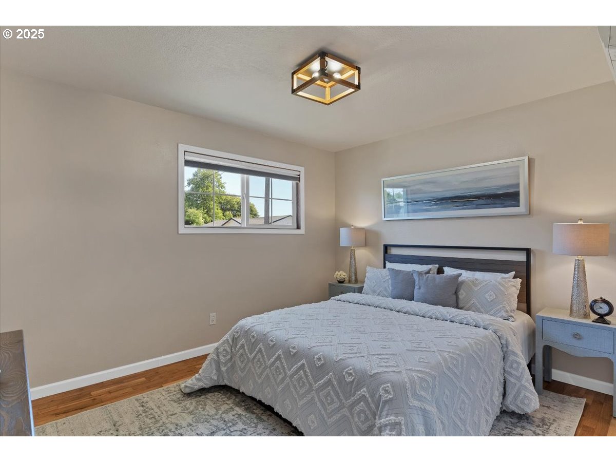 224 South 24th Street Philomath, OR 97370 - Photo 26 of 46 a bedroom with a bed and a window