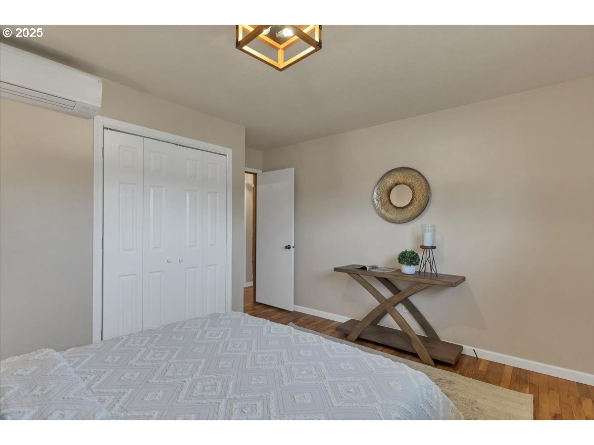 224 South 24th Street Philomath, OR 97370 - Photo 28 of 46 a room with gym equipment and view of living room