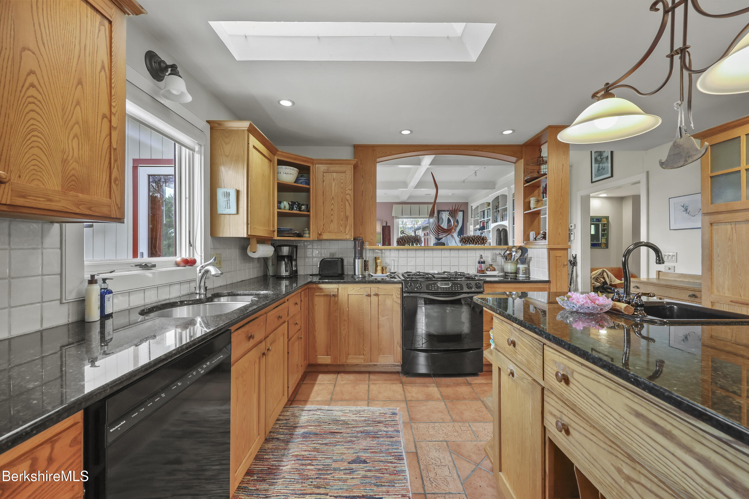 821 Pattison Road North Adams, MA 01247 - Photo 26 of 68 a kitchen with stainless steel appliances granite countertop sink stove and granite counter top
