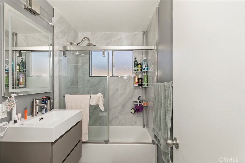 114 Juniper Street Brea, CA 92821 - Photo 14 of 64 a bathroom with a bathtub and a sink