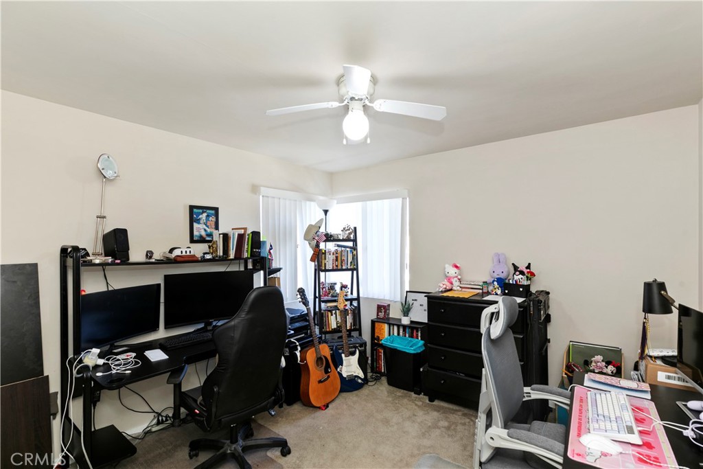 114 Juniper Street Brea, CA 92821 - Photo 17 of 64 a view of a workspace with furniture and a window