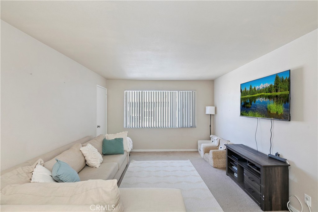 114 Juniper Street Brea, CA 92821 - Photo 19 of 64 a living room with furniture and a flat screen tv
