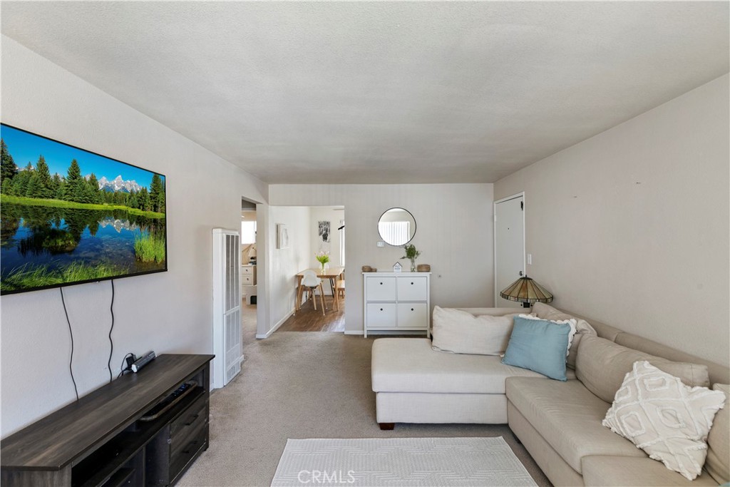 114 Juniper Street Brea, CA 92821 - Photo 21 of 64 a living room with furniture and a flat screen tv
