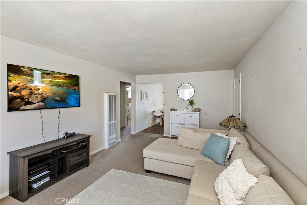 114 Juniper Street Brea, CA 92821 - Photo 22 of 64 a living room with furniture and a flat screen tv