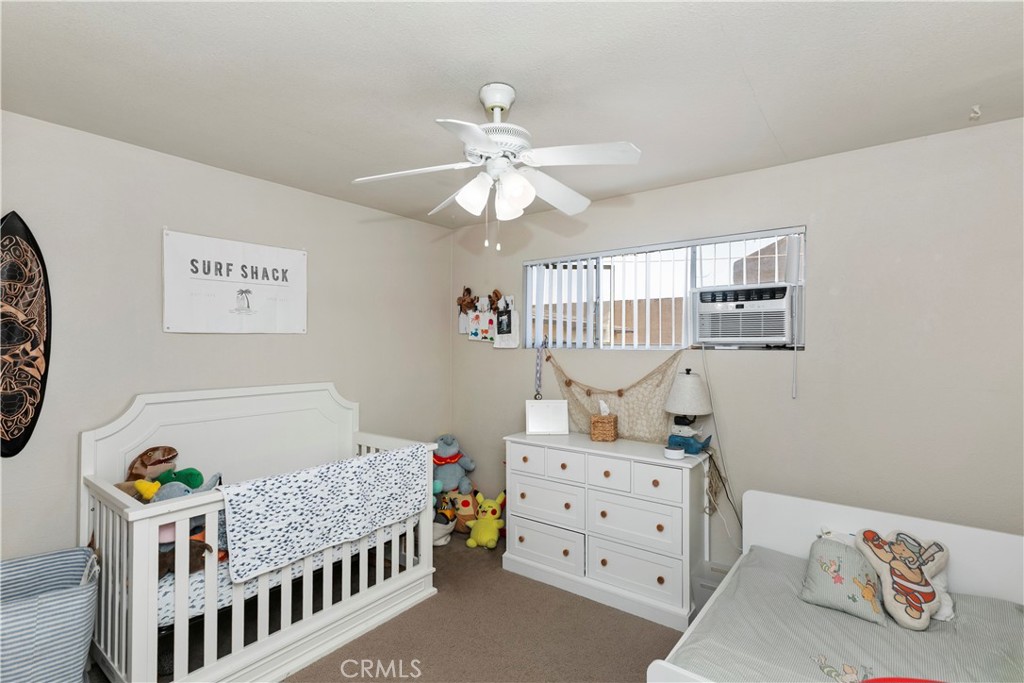 114 Juniper Street Brea, CA 92821 - Photo 29 of 64 a bedroom with furniture and a window