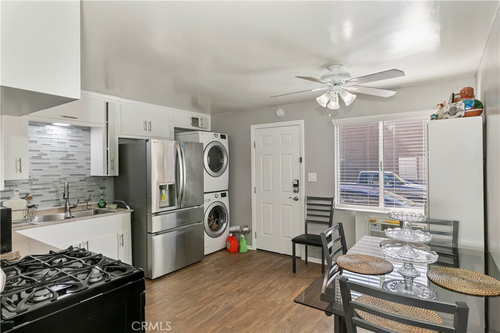 114 Juniper Street Brea, CA 92821 - Photo 39 of 64 a kitchen with furniture a refrigerator and a stove