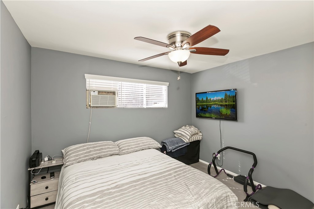 114 Juniper Street Brea, CA 92821 - Photo 44 of 64 a bedroom with a bed and a flat screen tv