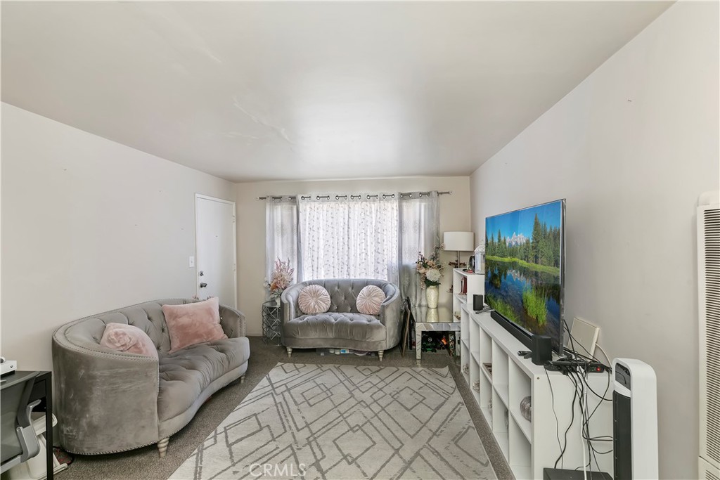 114 Juniper Street Brea, CA 92821 - Photo 47 of 64 a living room with furniture and a flat screen tv