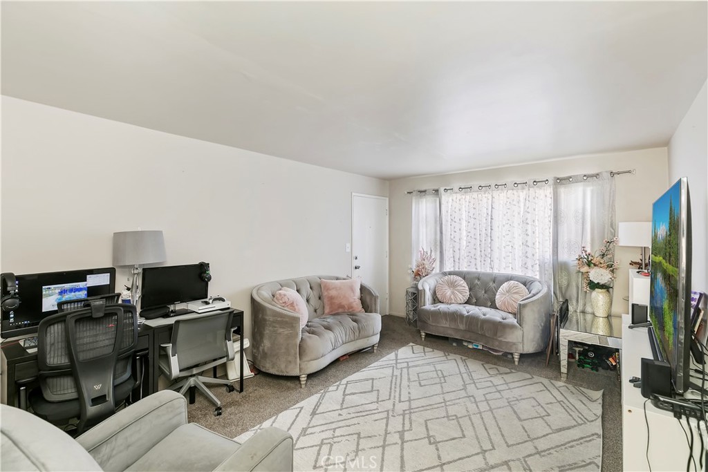114 Juniper Street Brea, CA 92821 - Photo 48 of 64 a living room with furniture and a flat screen tv