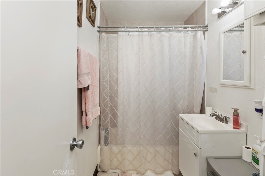 114 Juniper Street Brea, CA 92821 - Photo 49 of 64 a bathroom with a sink toilet and shower