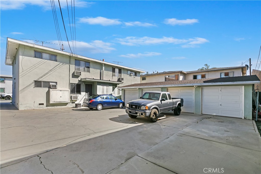 114 Juniper Street Brea, CA 92821 - Photo 5 of 64 a view of a cars park in front of house