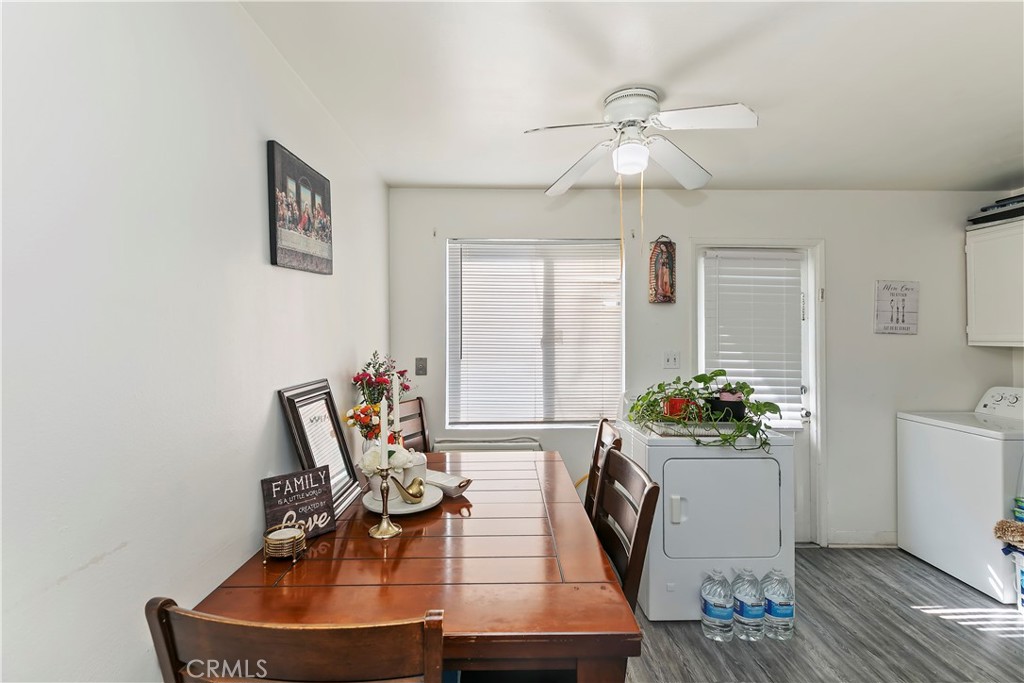 114 Juniper Street Brea, CA 92821 - Photo 55 of 64 a view of a dining room with furniture and a chandelier