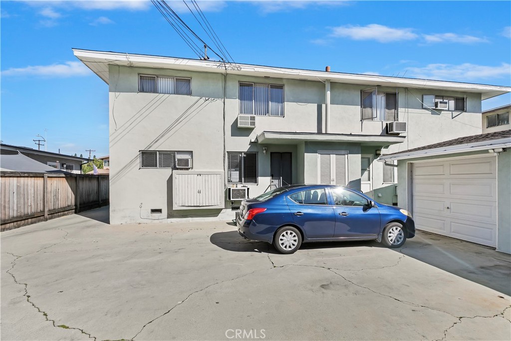 114 Juniper Street Brea, CA 92821 - Photo 59 of 64 a car parked in front of white house