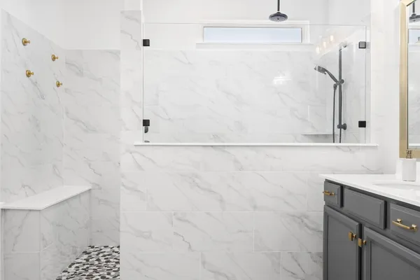 a bathroom with a sink and a shower