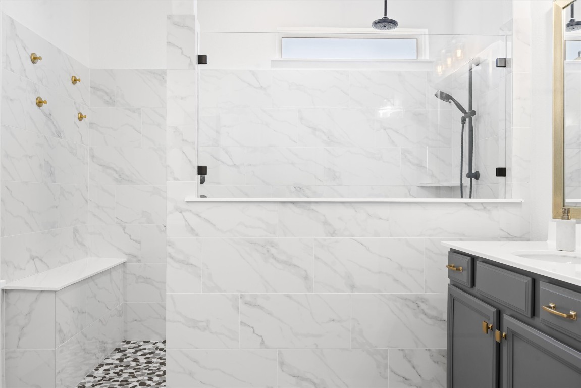 400 Turnbuckle Bend Leander, TX 78641 - Photo 19 of 40 a bathroom with a sink and a shower