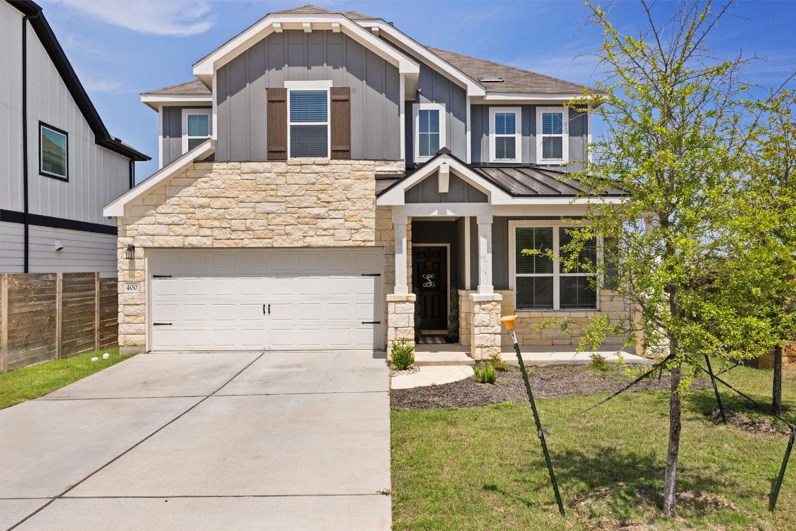 400 Turnbuckle Bend Leander, TX 78641 - Photo 2 of 40 a front view of a house with garden