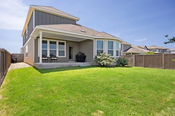 a view of a house with patio