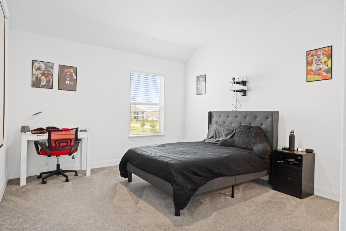 400 Turnbuckle Bend Leander, TX 78641 - Photo 31 of 40 a bedroom with a bed and a window