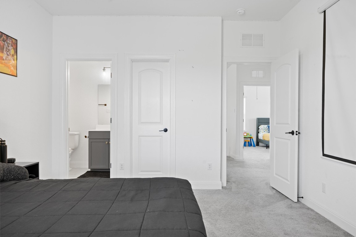 400 Turnbuckle Bend Leander, TX 78641 - Photo 32 of 40 a view of a bedroom a bedroom and front door