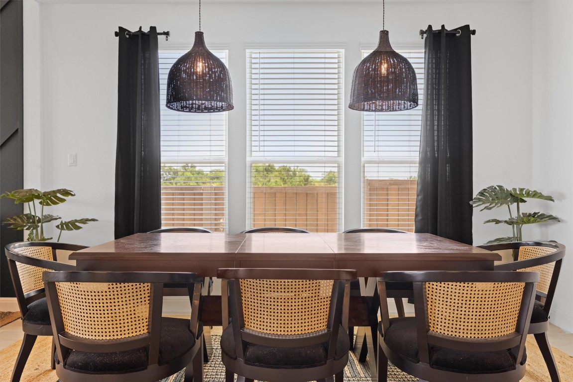 400 Turnbuckle Bend Leander, TX 78641 - Photo 9 of 40 a view of a dining room with furniture and window