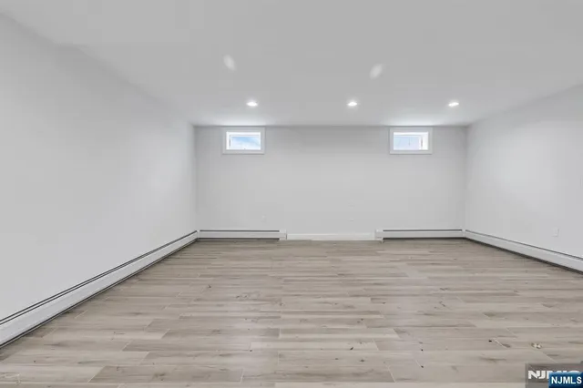 a bathroom with a shower and a toilet