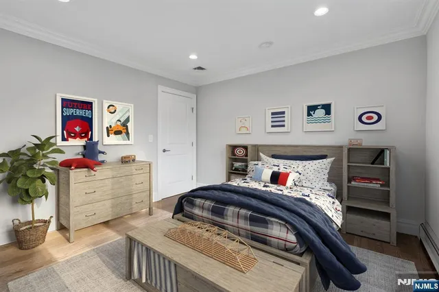 a bedroom with a bed and furniture