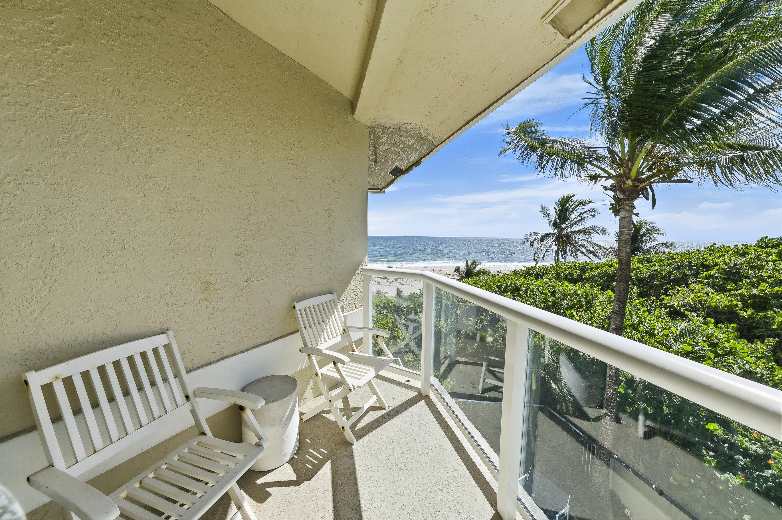a view of balcony with wooden floor