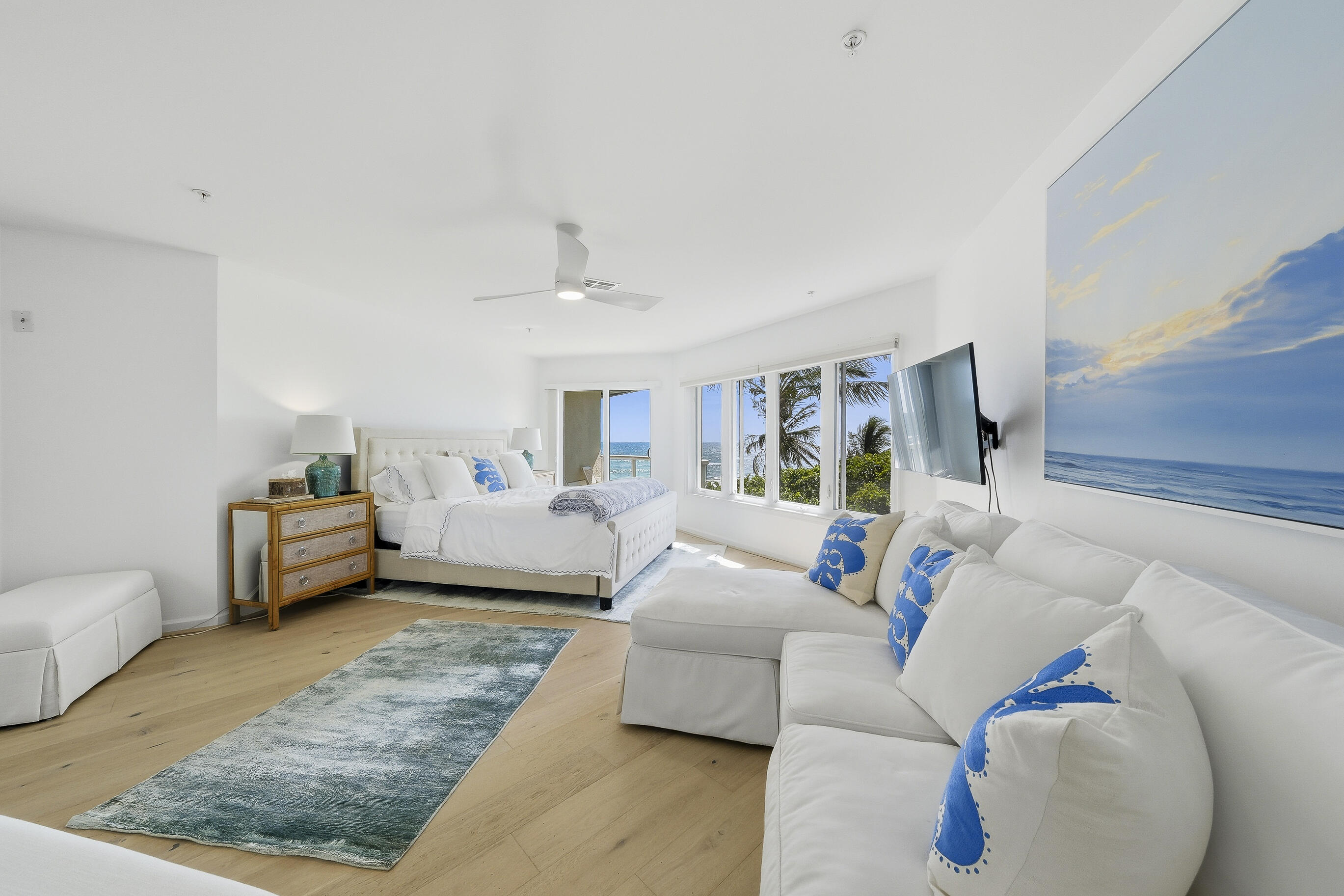 4535 Coquina Road Ocean Ridge, FL 33435 - Photo 29 of 45 a bedroom with furniture and wooden floor