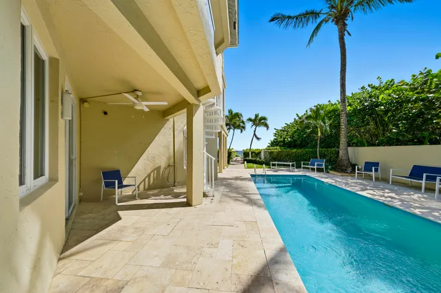 a house with trees in the background