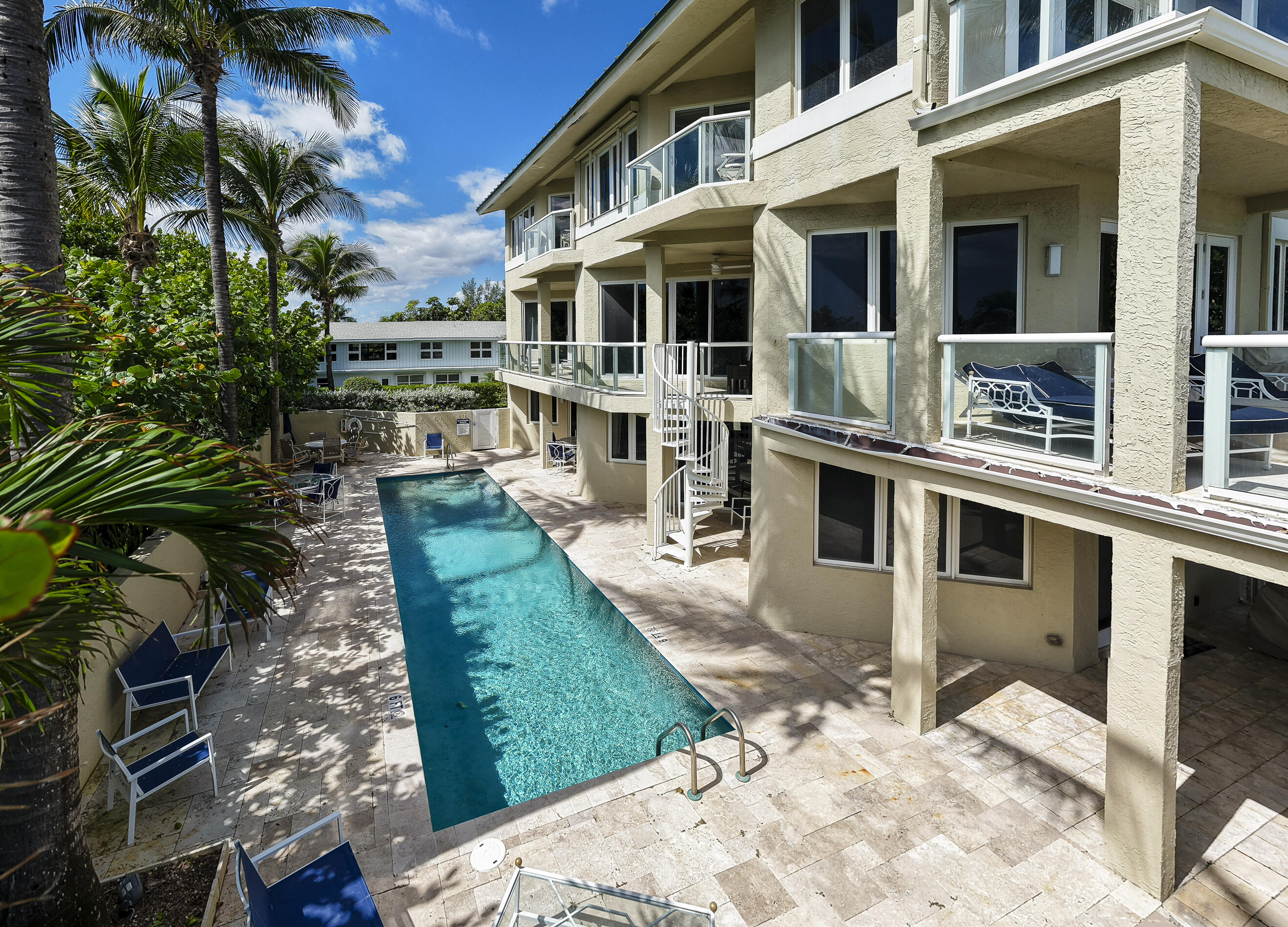 4535 Coquina Road Ocean Ridge, FL 33435 - Photo 43 of 45 a view of a house with a yard balcony and sitting area
