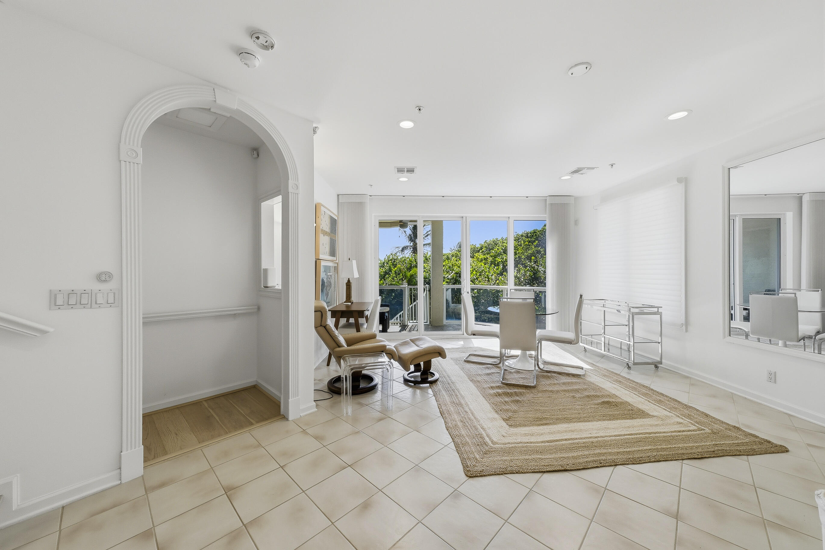 4535 Coquina Road Ocean Ridge, FL 33435 - Photo 9 of 45 a living room with a large window