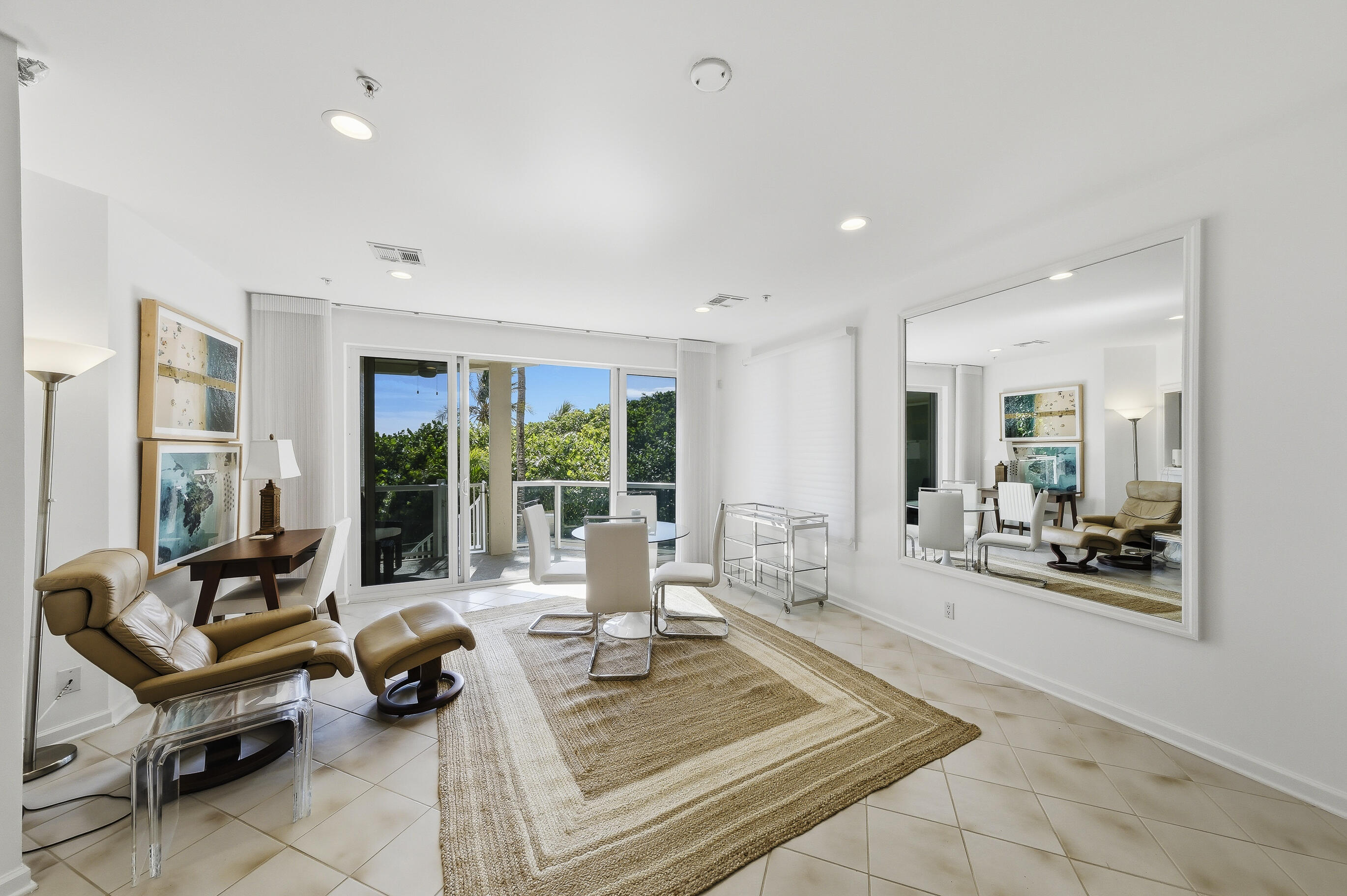 4535 Coquina Road Ocean Ridge, FL 33435 - Photo 10 of 45 a living room with furniture and a table