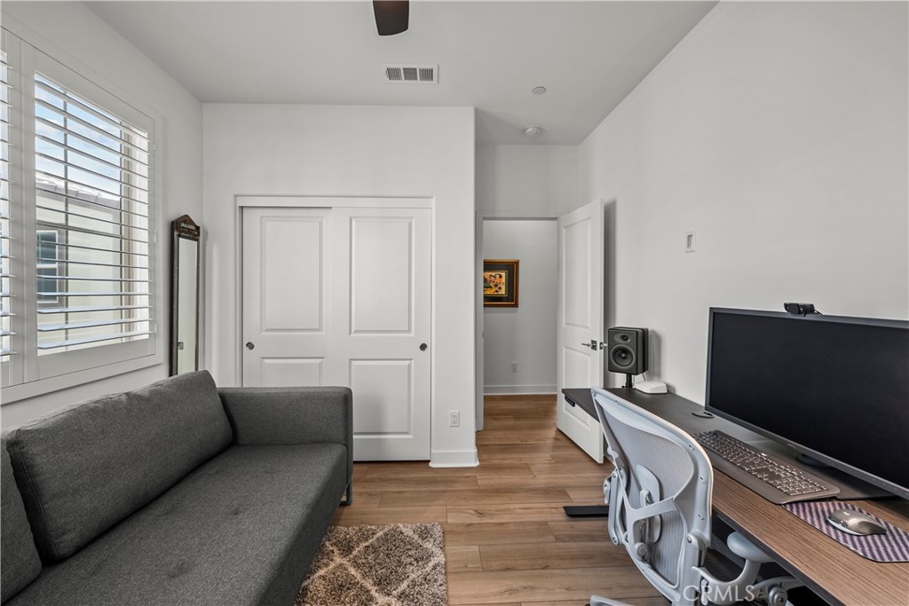 1663 Rosewell Road West Covina, CA 91791 - Photo 31 of 45 a bedroom with furniture and a flat screen tv