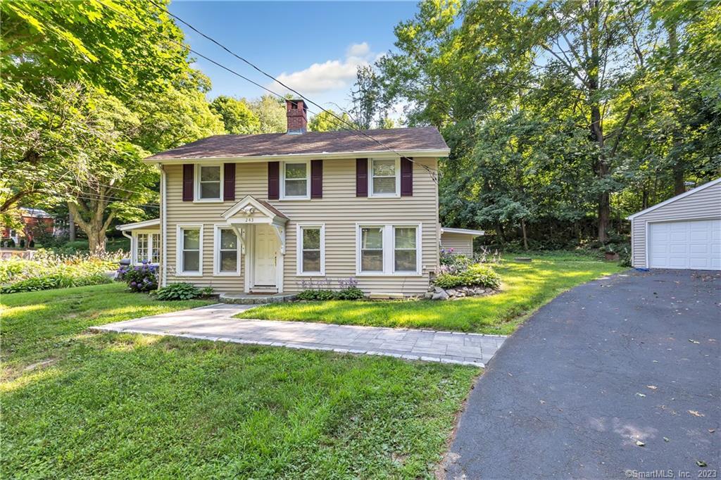241-243 Cottage Street Monroe, CT 06468 - Photo 1 of 1 a view of a house with a yard patio and swimming pool