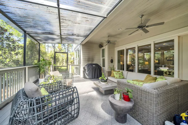 an aerial view of a houses with a lake view